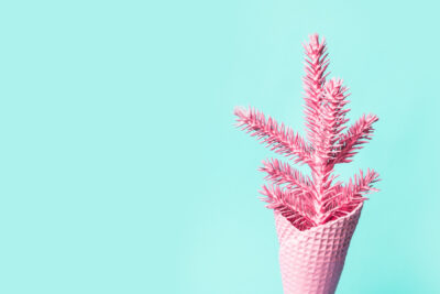 pink ice cream cone with pink Christmas tree top inside